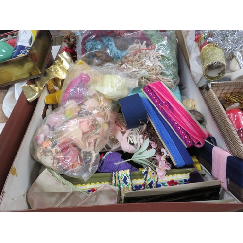 255 - Large lot of vintage ribbon and a vintage suitcase containing vintage christmas items.