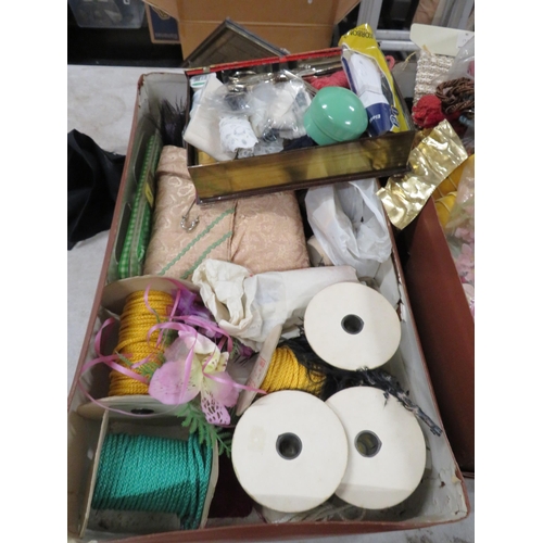 255 - Large lot of vintage ribbon and a vintage suitcase containing vintage christmas items.