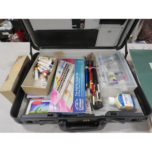 263 - 2 Briefcases containing a large selection of art supplies and caligraphy pens.