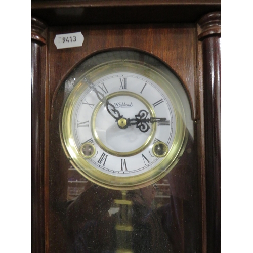 364 - Highland' Mechanical Wall Clock in running order. With Key and Pendulum