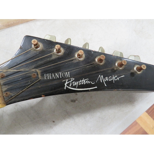 372 - Phantom Rhythm Master, Electric Six String Guitar with clear plastic carry case. See photos.