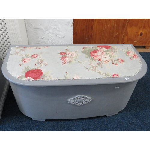 391 - Two Grey painted lift lid ottomans with upholstered tops. Largest measures approx 17 x 37 x 18 Inche... 