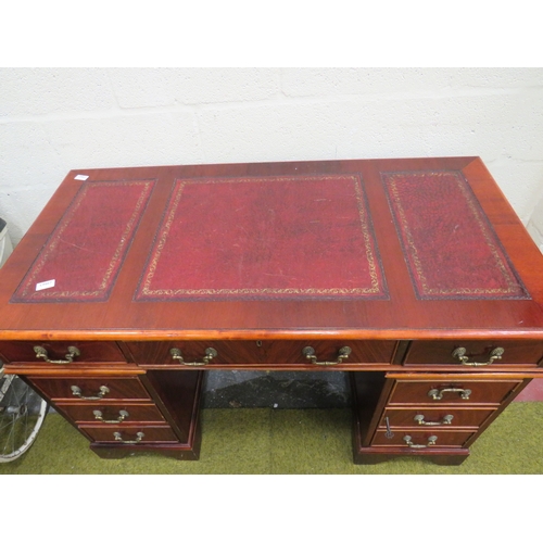 400 - Reproduction Knee Hole twin pedestal desk with three segment writing surface in Red tooled Leather. ... 