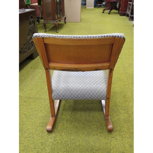 409 - Early to Mid 20th Century Childs or Dolls Rocking chair with good upholstery. Made from light Oak in... 