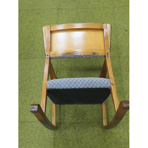 409 - Early to Mid 20th Century Childs or Dolls Rocking chair with good upholstery. Made from light Oak in... 