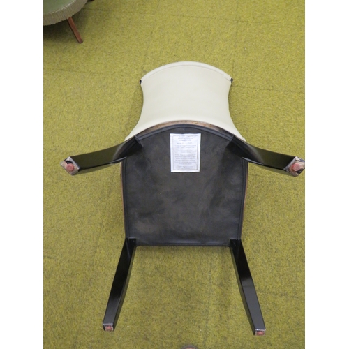 411 - Four Nicely upholstered dining chairs in cream leatherette . Fire tickets present. Seat height 18 in... 