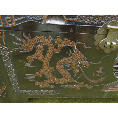 414 - Late19th/Early 20th Century Oriental Carved Chest with Camphorwood interior. Lots of carving to pane... 