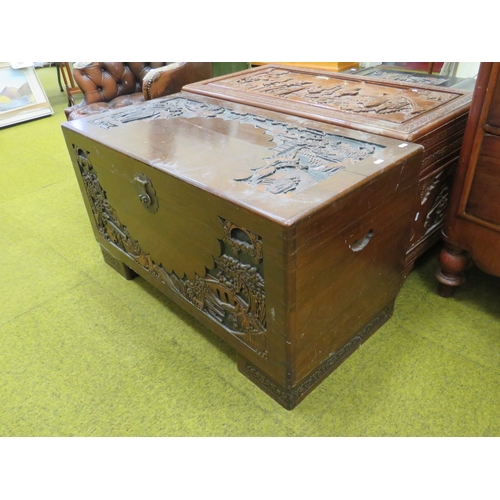 415 - Early 20th Century Oriental Carved Chest with Camphor wood interior. Carving to top and front panels... 