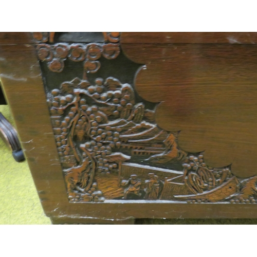 415 - Early 20th Century Oriental Carved Chest with Camphor wood interior. Carving to top and front panels... 