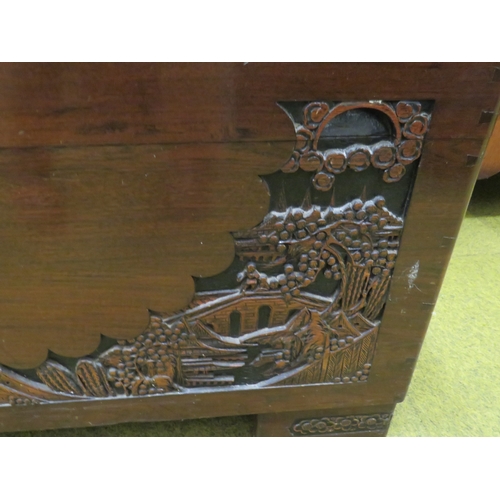 415 - Early 20th Century Oriental Carved Chest with Camphor wood interior. Carving to top and front panels... 