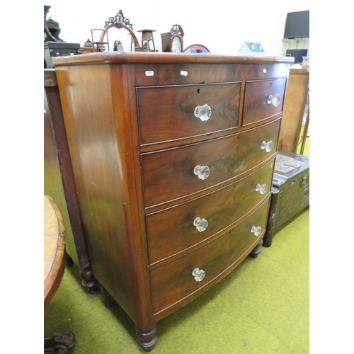 418 - Victorian Bow Fronted Chest in Flame Mahogany with three graduated long drawers and two short drawer... 