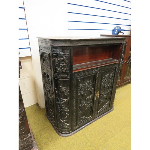 420 - Early 20th Century Oriental Drinks Cabinet. Covered in a plethora of carving to all panels. Side doo... 