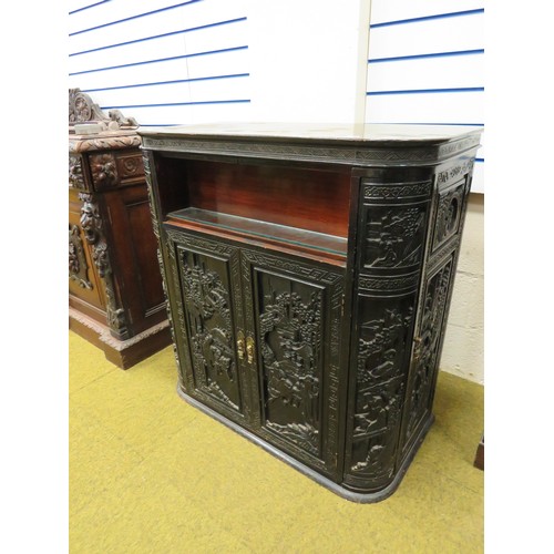 420 - Early 20th Century Oriental Drinks Cabinet. Covered in a plethora of carving to all panels. Side doo... 