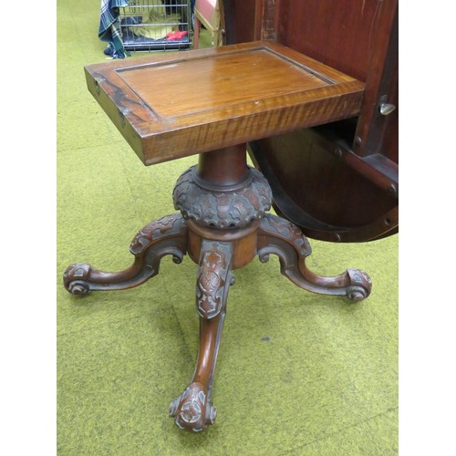 424 - Late Victorian Tilt Top Table with Oval Walnut Veneer top. Heavy Mahogany base with four curved legs... 