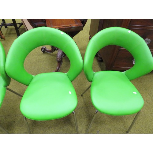 426 - Four Modern Chinese made chairs with Chromed Tubular steel frames, Vivid Green Leatherette upholster... 