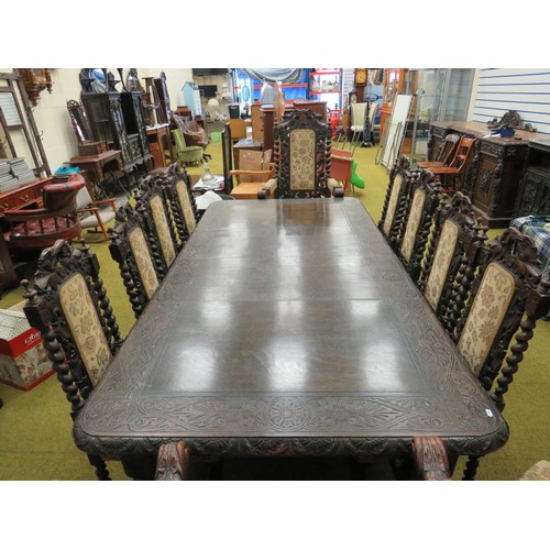 428 - Late 19th Century Dark Oak wind out Dining table with two 18 inch extention leaves. Heavily carved l... 