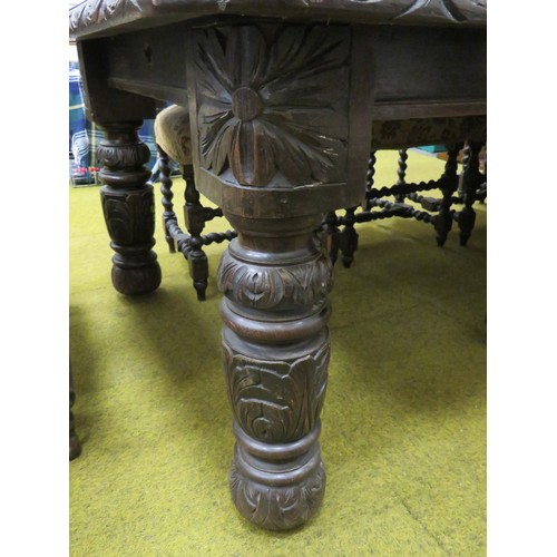 428 - Late 19th Century Dark Oak wind out Dining table with two 18 inch extention leaves. Heavily carved l... 