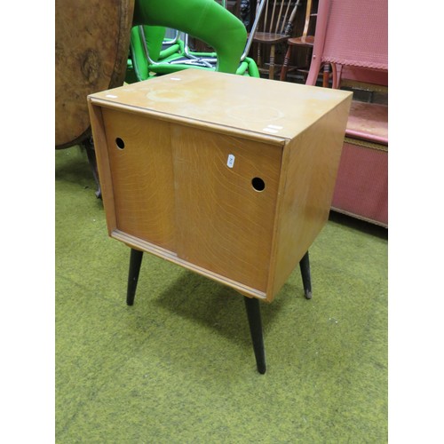 430 - Pleasing small Teak effect Record cabinet. Raised on screw in , ebonised tapered cylindrical legs, s... 