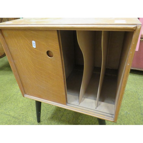 430 - Pleasing small Teak effect Record cabinet. Raised on screw in , ebonised tapered cylindrical legs, s... 