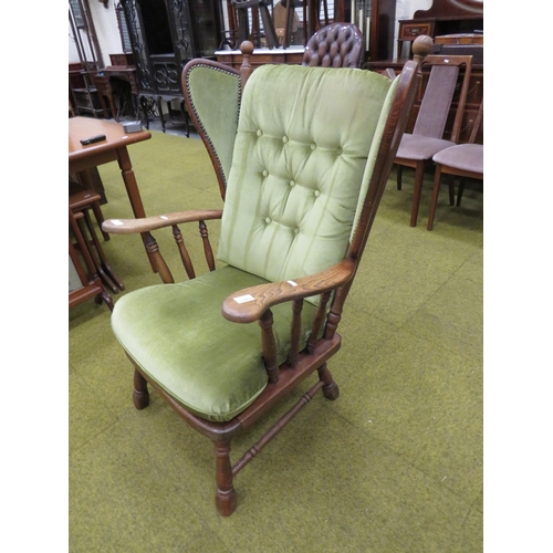 436 - Oak Armchair with turned legs and arm supports. Detachable cushions, Fixed wings. Height to seat 17 ... 