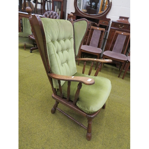 436 - Oak Armchair with turned legs and arm supports. Detachable cushions, Fixed wings. Height to seat 17 ... 