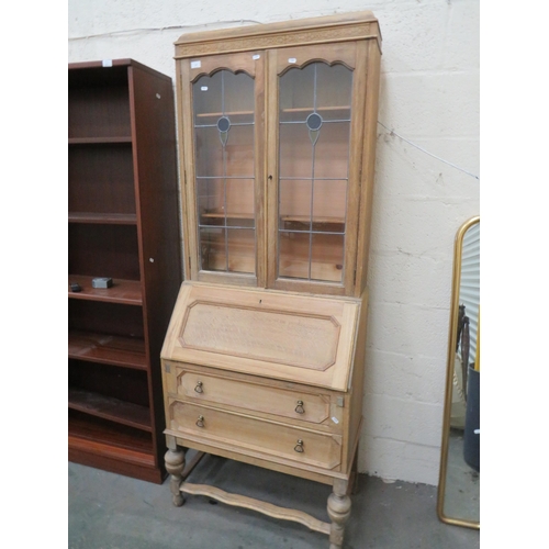 439 - Pale Oak Secrataire/Bookcase. Drop down writing surface, Leaded glass to Bookcase. Measures H:77 x W... 