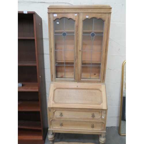 439 - Pale Oak Secrataire/Bookcase. Drop down writing surface, Leaded glass to Bookcase. Measures H:77 x W... 