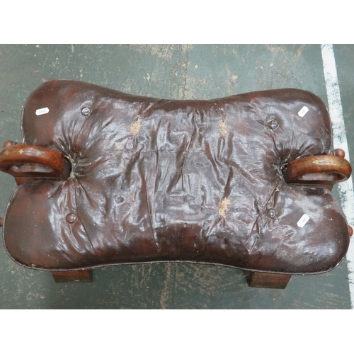 441 - Two Middle Eastern Camel seats. Wooden frames with Leather Saddles. Each measures approx H:14 x W:23... 