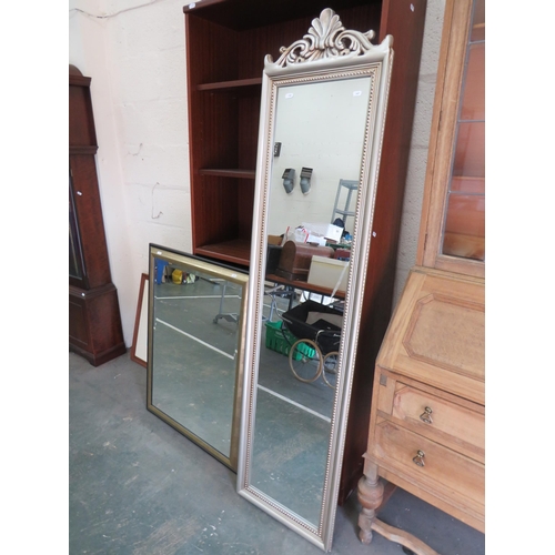 448 - Large Oblong mirror with decorative Scrolled top. Measures 69 x 17 inches plus one other mirror whic... 