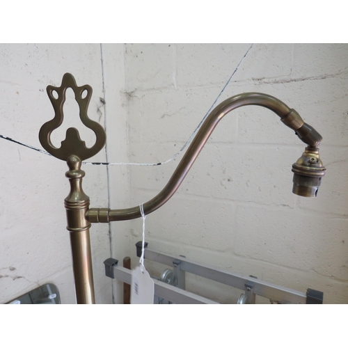 449 - Brass Standard lamp to resemble a Victorian Gas lamp. Floor mounted switch. Approx 58 inches tall.