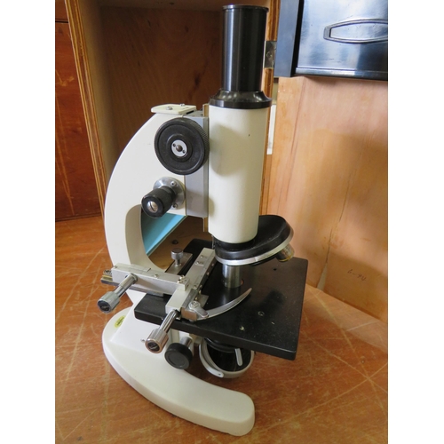 455 - Brunel XSP-03 model microscope with original instruction manual  in wooden case.