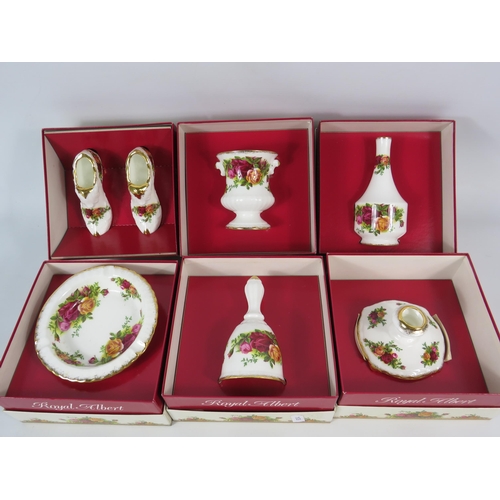 141 - Seven pieces of Royal Albert Old country Roses decorative china items all with boxes.