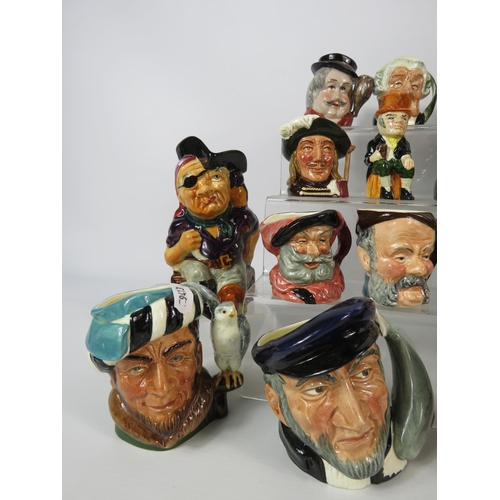147 - Large selection of Medium and small sized toby jugs mainly by Royal Doulton.