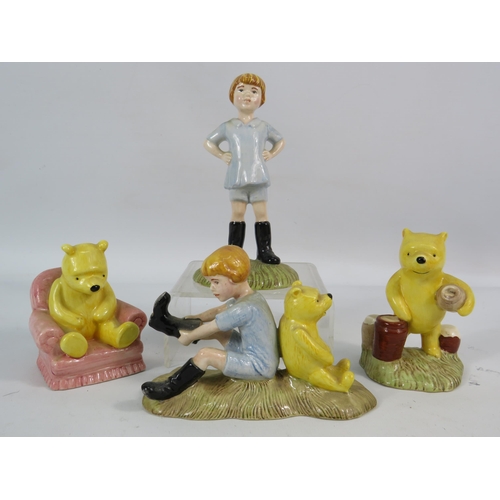 220 - Four Royal Doulton Winne the Pooh figurines.