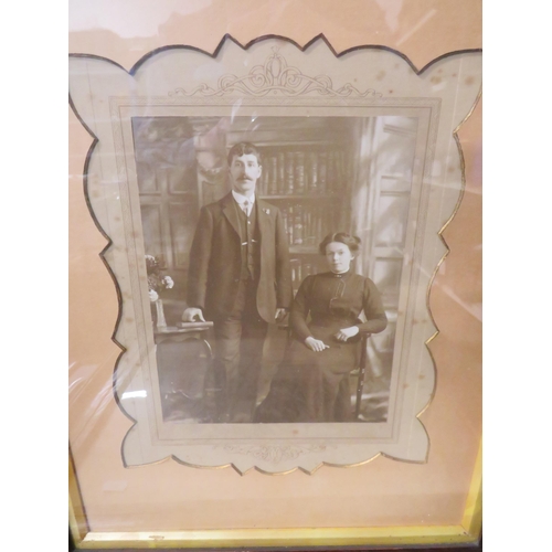 471 - Framed WW1 discharge certificate plus an old Victorian framed family photo. See photos.