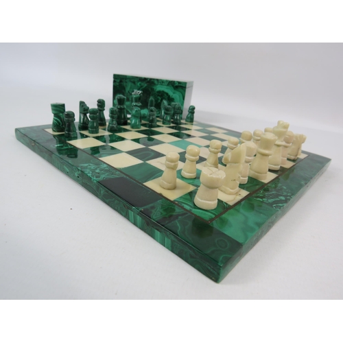 233 - Malachite and marble small chess set with a malachite storage box. The board measures 7.5