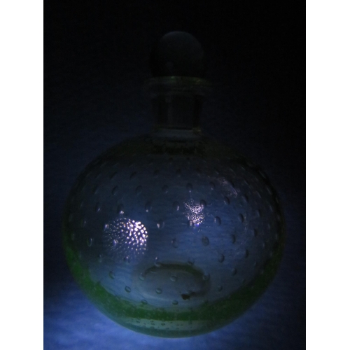 238 - Three vintage Uranium glass scent bottles.