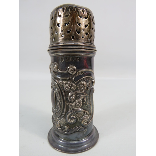 254 - London 1897 Sterling silver sugar sifter with embossed decoration and a blank cartouche, 4.5