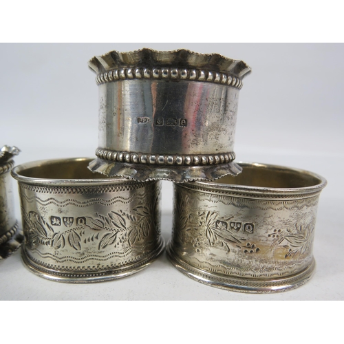 292 - Four Sterling silver napkin rings hallmarks for Birmingham and Chester, 70.4 grams.