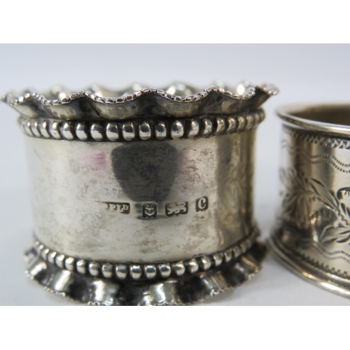 292 - Four Sterling silver napkin rings hallmarks for Birmingham and Chester, 70.4 grams.