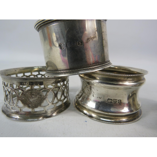 293 - Four Sterling silver napkin rings hallmarks for Birmingham and Chester, 46.7 grams.