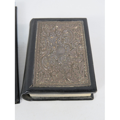 295 - Pocket Zodiac book and dictionary with leather covers and sterling silver fronts plus a silverplated... 