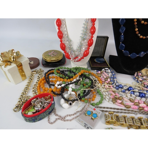 298 - Mixed lot of costume jewellery, watches, brooches, earrings etc.