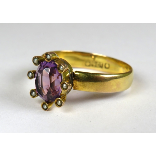 304 - 9ct Yellow Gold Ring set with an Oval Amethyst (10 x 6mm), surrounded by eight seed pearls.  Finger ... 