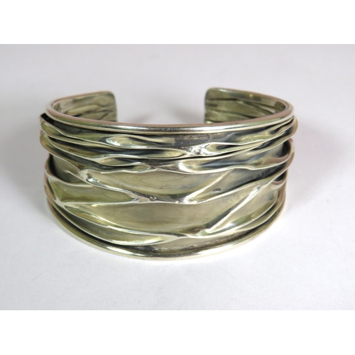 322 - 925 Sterling Silver Cuff Bangle with textured finish. Approx 30g in weight.