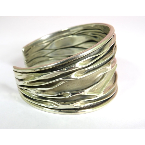 322 - 925 Sterling Silver Cuff Bangle with textured finish. Approx 30g in weight.