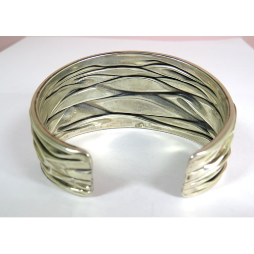 322 - 925 Sterling Silver Cuff Bangle with textured finish. Approx 30g in weight.