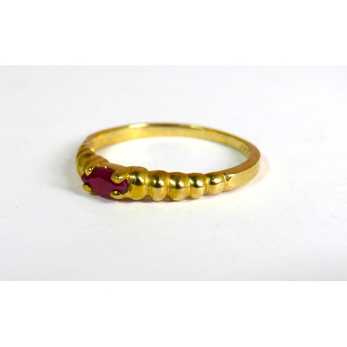 334 - 9ct Yellow Gold Ring set with an Oval Ruby which measures approx 5 x 3mm.  Fingers size R-5 1.9g