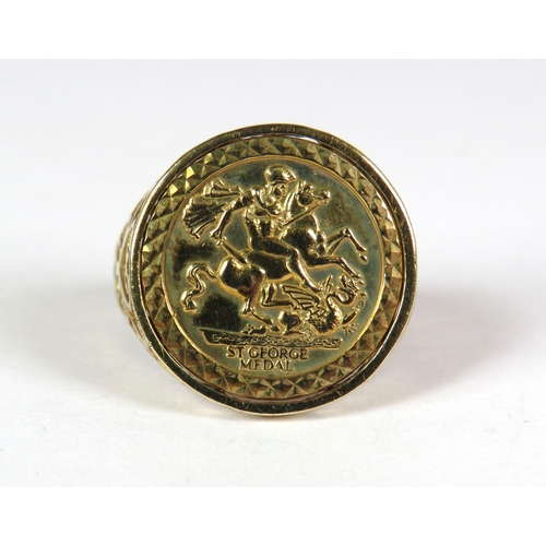 335 - 9ct Yellow Gold Half Sovereign Mount ring set with Faux Half Sovereign. Decorative Pierced Shoulders... 