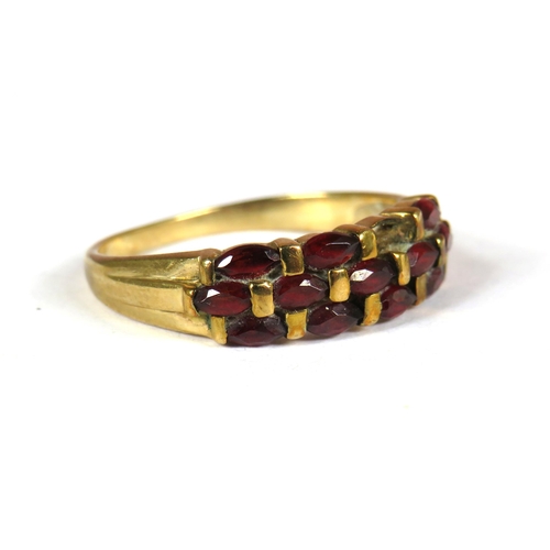 339 - 9ct Yellow Gold Garnet Set ring. Finger size 'R' 2.7g (One Stone Missing)